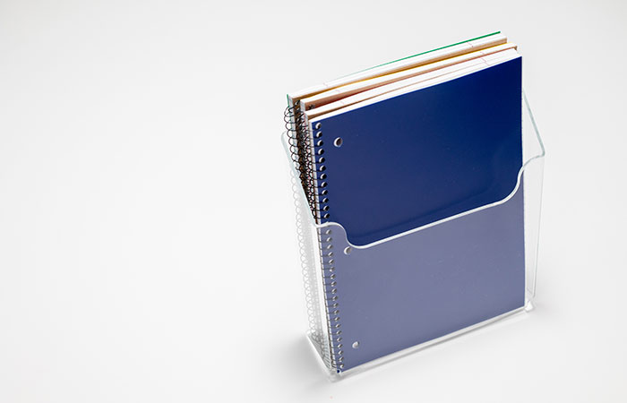 Plastic holder for notebooks